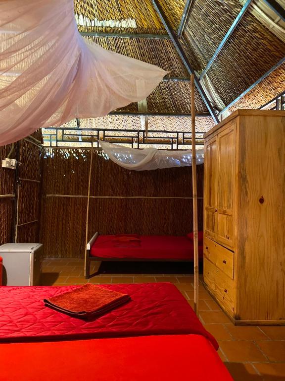 Postel nebo postele na pokoji v ubytování Hometravel Mekong Can Tho