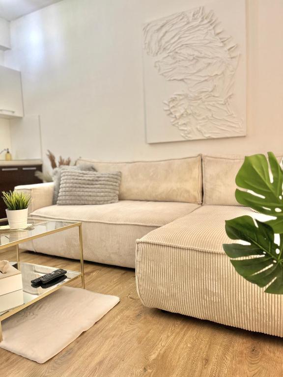 A seating area at URBAN JUNGLE Apartment old town Air Conditioned