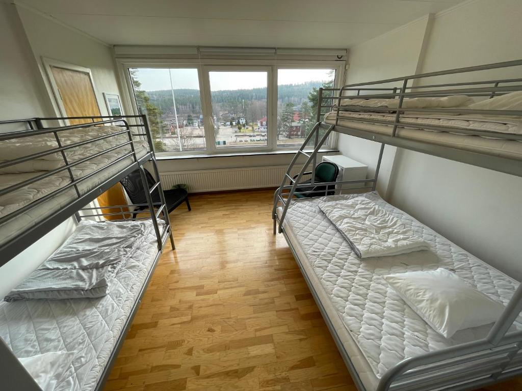 Postel nebo postele na pokoji v ubytování Hestra Guesthouse