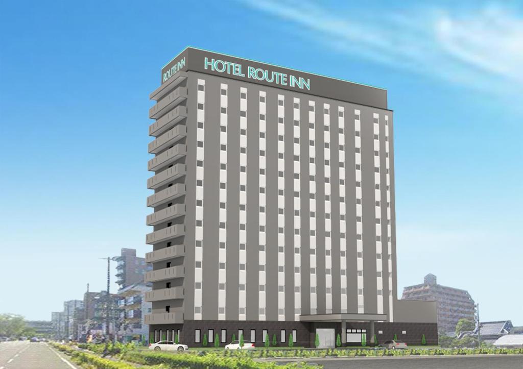 和歌山市にあるHotel Route Inn Grand Wakayama Eki Higashiguchiの都市のヒルトンホテルの描写