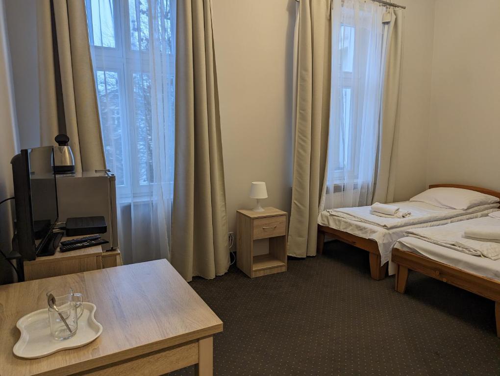 Postel nebo postele na pokoji v ubytování OSW Świnoujście Rybitwa
