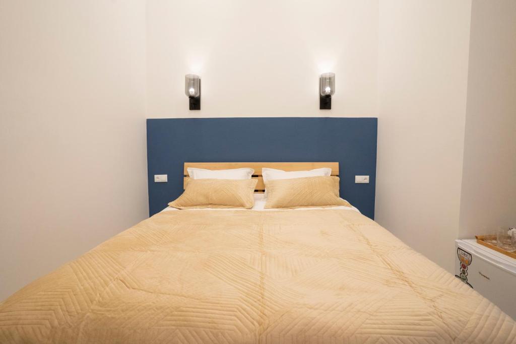 Postel nebo postele na pokoji v ubytování Sulitzer Residence