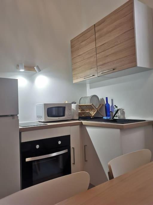 A cozinha ou cozinha compacta de Massalia Apartement, Le Panier