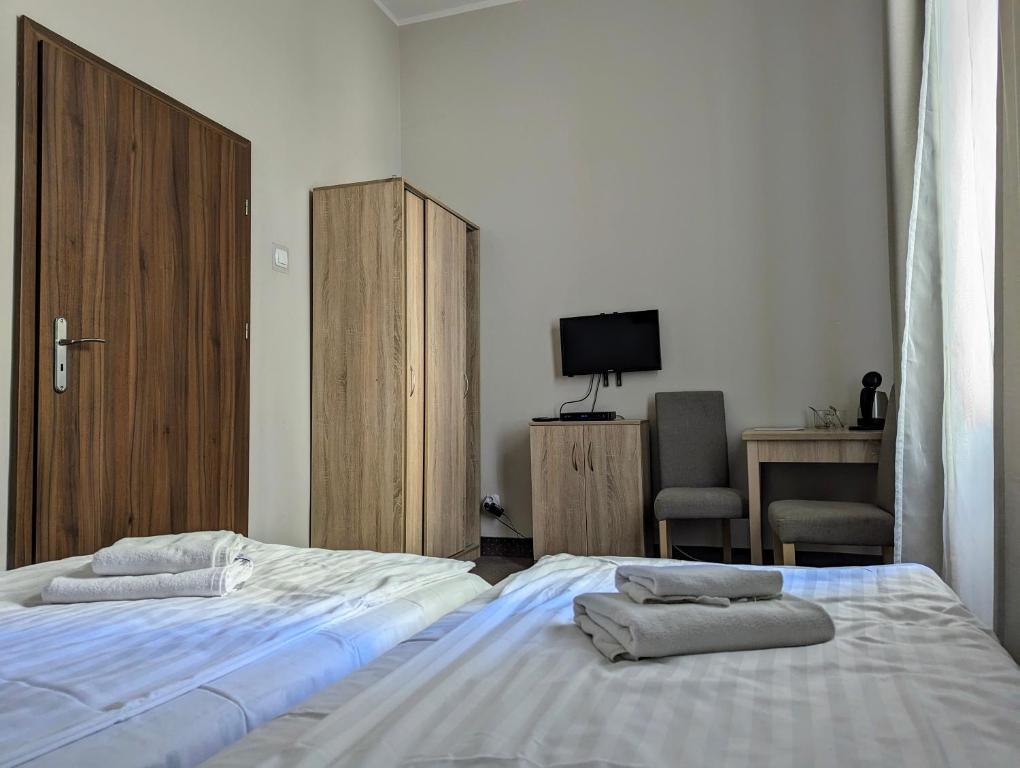Postel nebo postele na pokoji v ubytování OSW Świnoujście Rybitwa