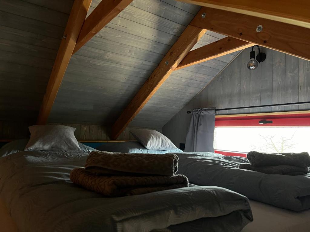 Letto o letti in una camera di Pension U Stříbrného Jelena - Tiny House