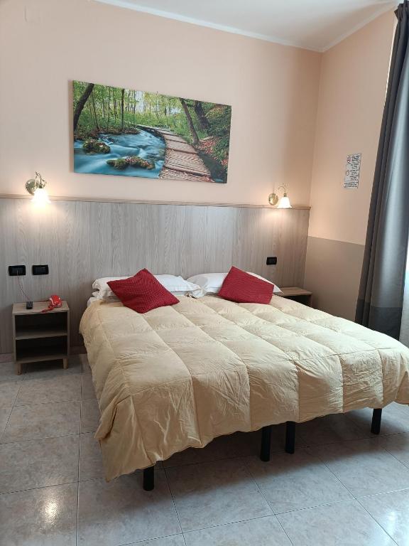 Postel nebo postele na pokoji v ubytování Hotel Galata