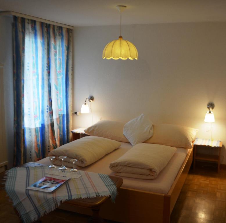 Postel nebo postele na pokoji v ubytování Bed and Breakfast Krone