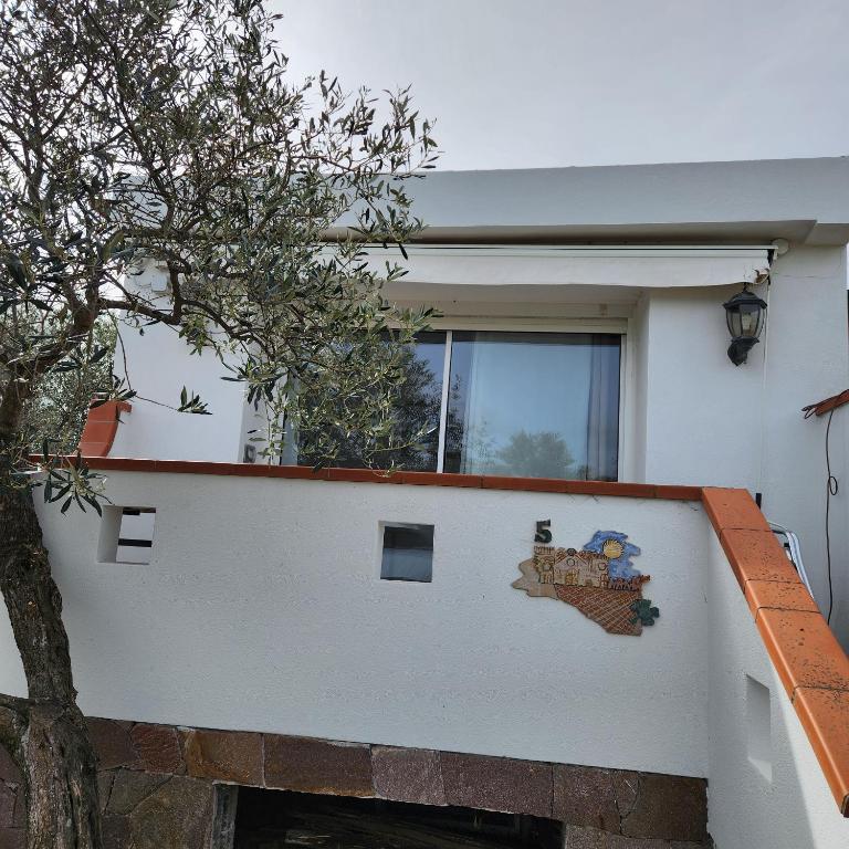 Balkón nebo terasa v ubytování Iloghe di Marras