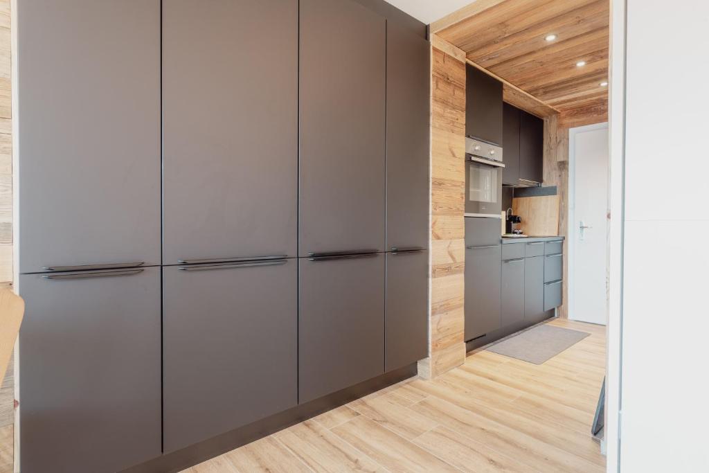 Cuisine ou kitchenette dans l'établissement Charmant studio avec une vue imprenable