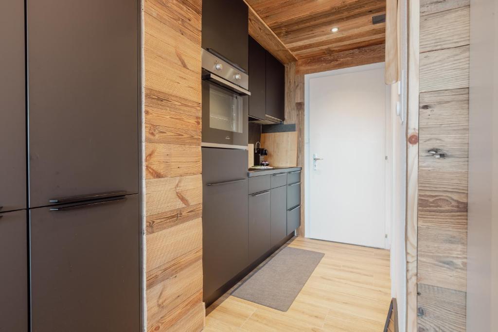 Cuisine ou kitchenette dans l'établissement Charmant studio avec une vue imprenable