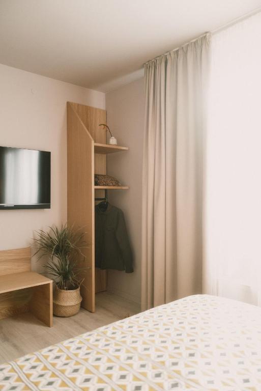 Postel nebo postele na pokoji v ubytování 2Places Soul