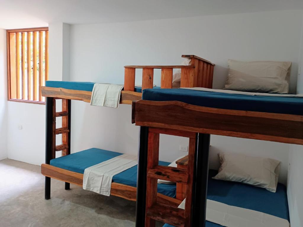 Postel nebo postele na pokoji v ubytování CASA RAÍZ RÍO ANCHO