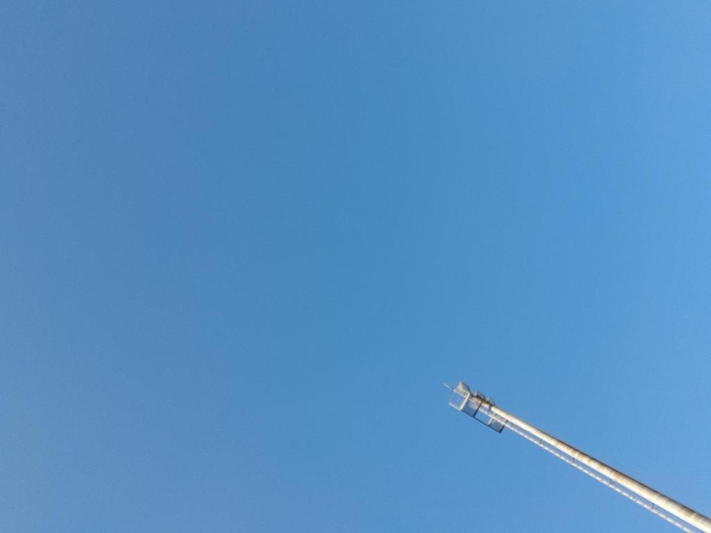 a toothbrush against a blue sky at Elva metsailu in Elva
