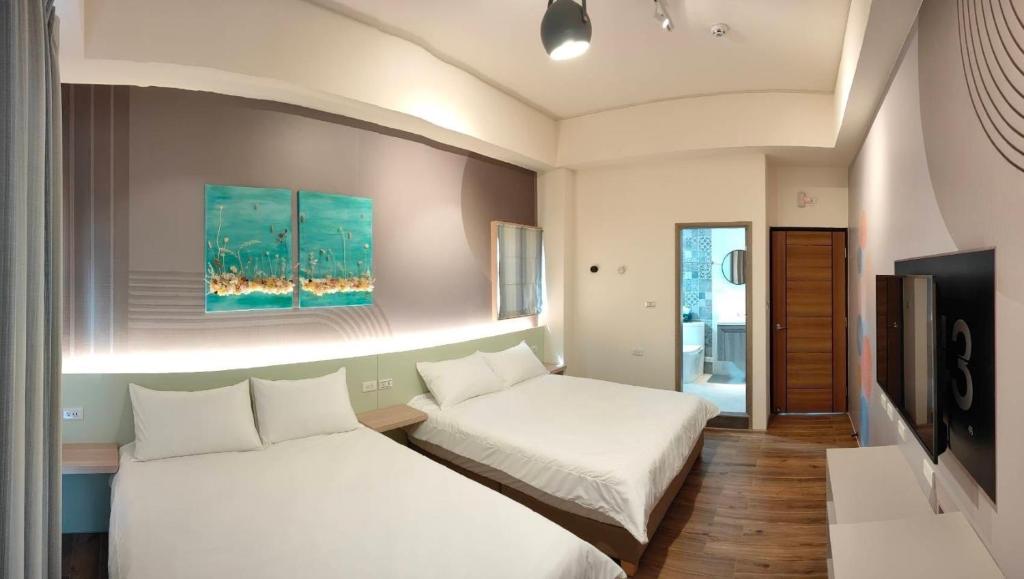 Postel nebo postele na pokoji v ubytování Mi Hai B&B