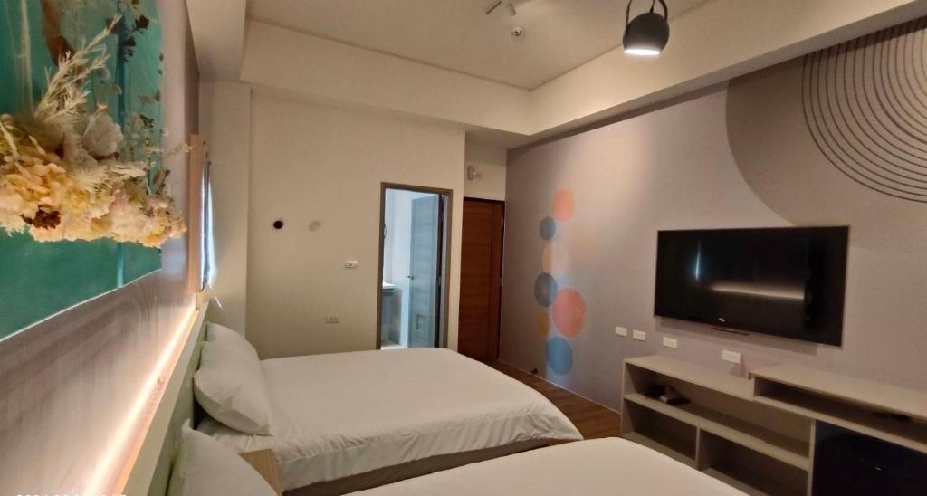 TV a/nebo společenská místnost v ubytování Mi Hai B&B
