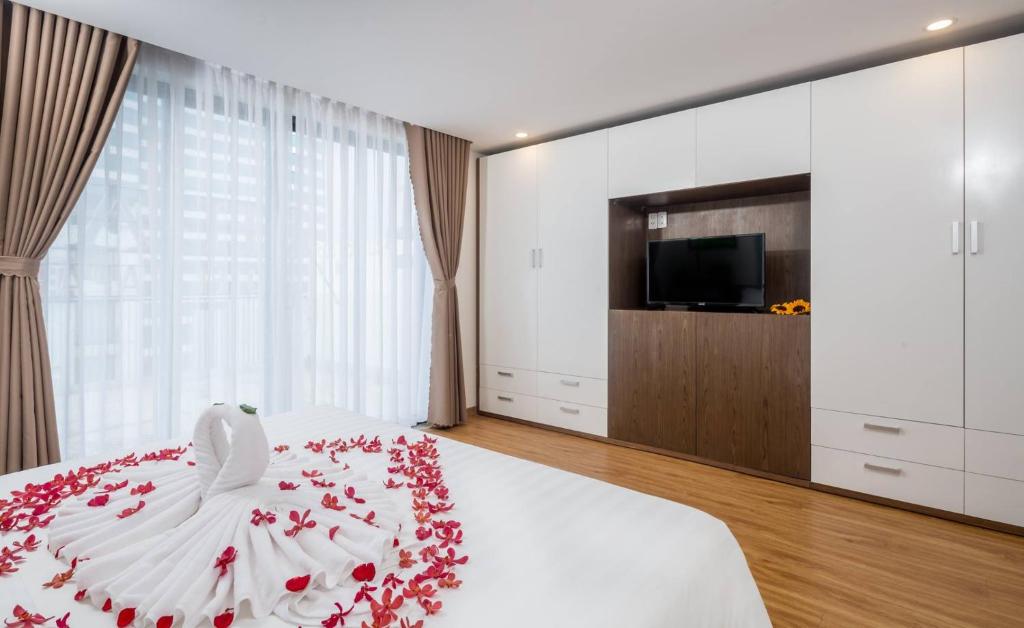 Postel nebo postele na pokoji v ubytování Silana Beachfront Hotel & Spa