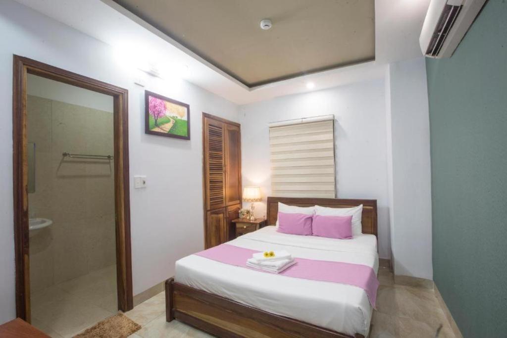 Postel nebo postele na pokoji v ubytování Lis Hotel