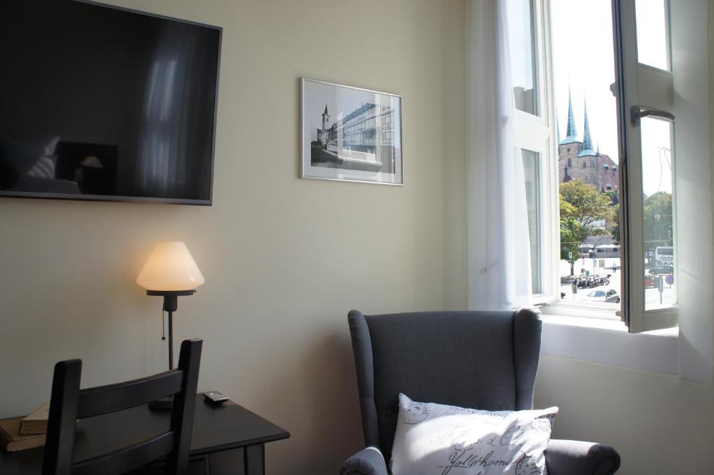 TV a/nebo společenská místnost v ubytování Hotel Domizil