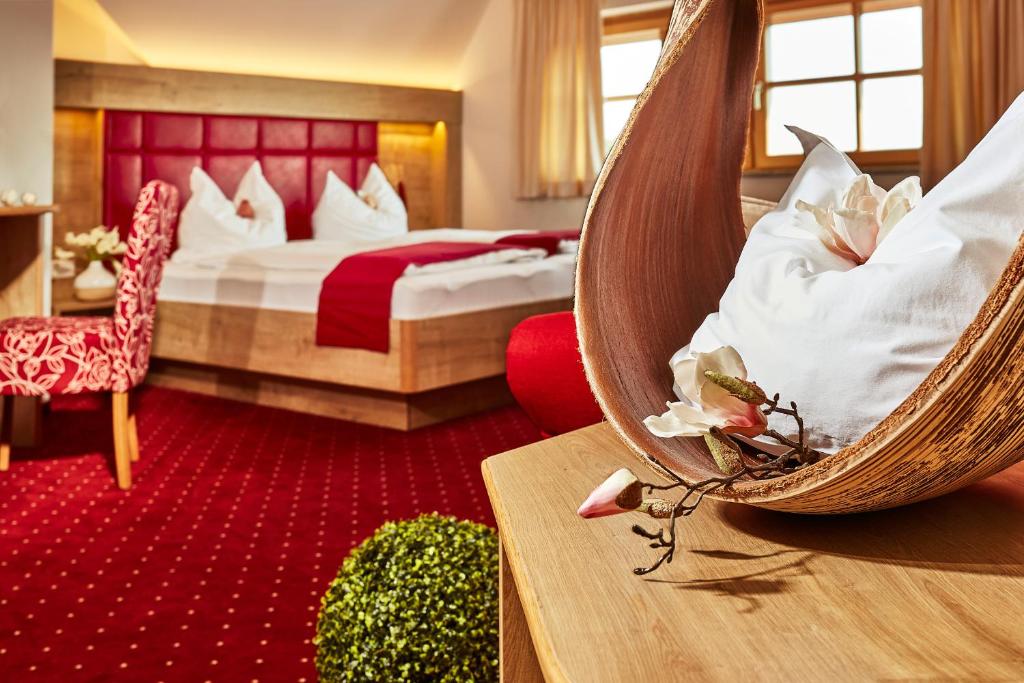 Postel nebo postele na pokoji v ubytování Donauhotel Lettnerhof