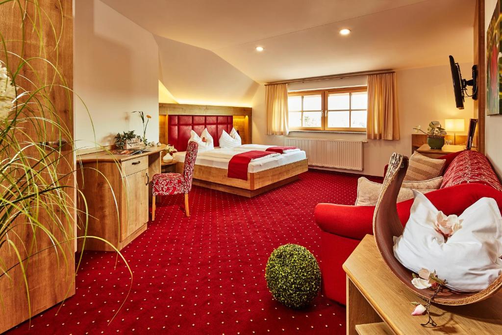 Postel nebo postele na pokoji v ubytování Donauhotel Lettnerhof