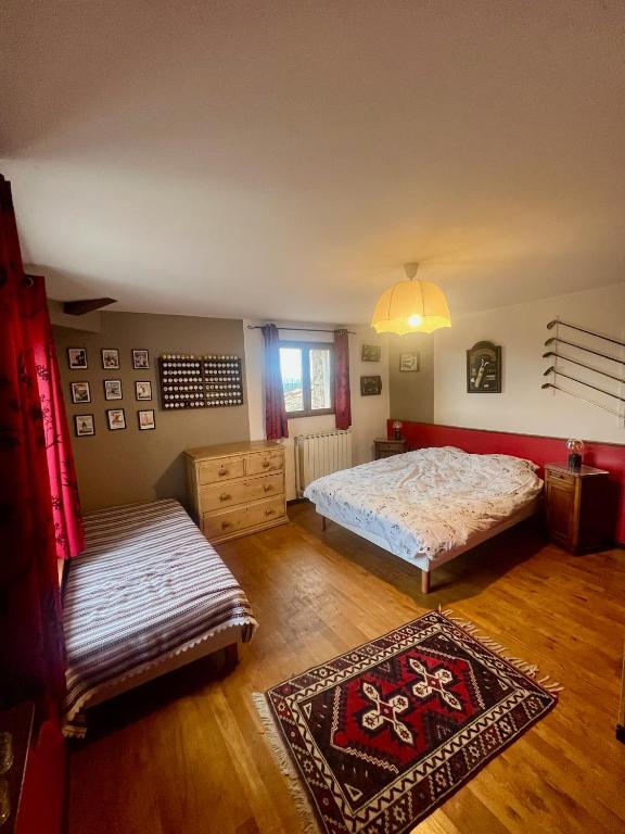 Postel nebo postele na pokoji v ubytování Les Garennes