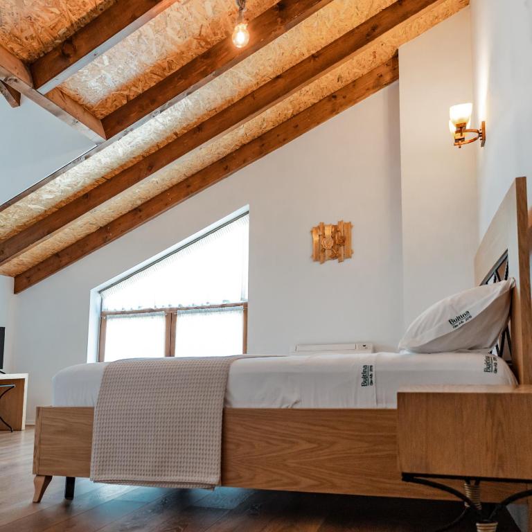 Postel nebo postele na pokoji v ubytování Gle-Alb AgroTourism