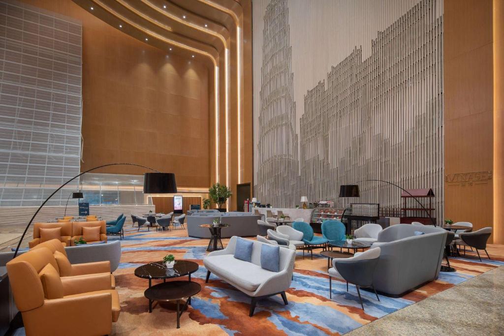 Posezení v ubytování Wyndham Grand Zhaoqing Downtown