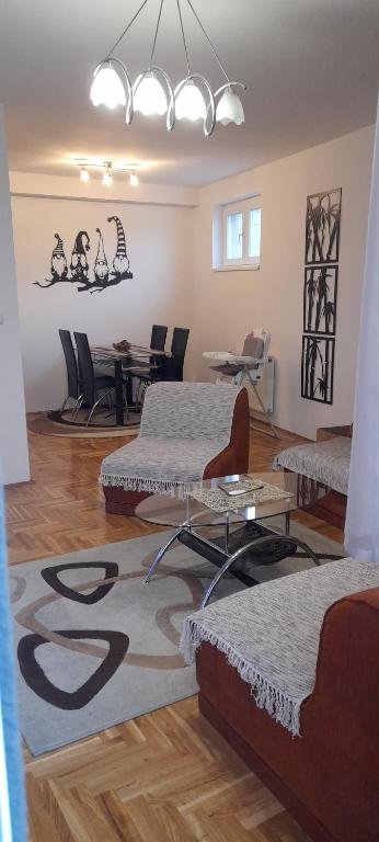 Area soggiorno di Apartman Dado
