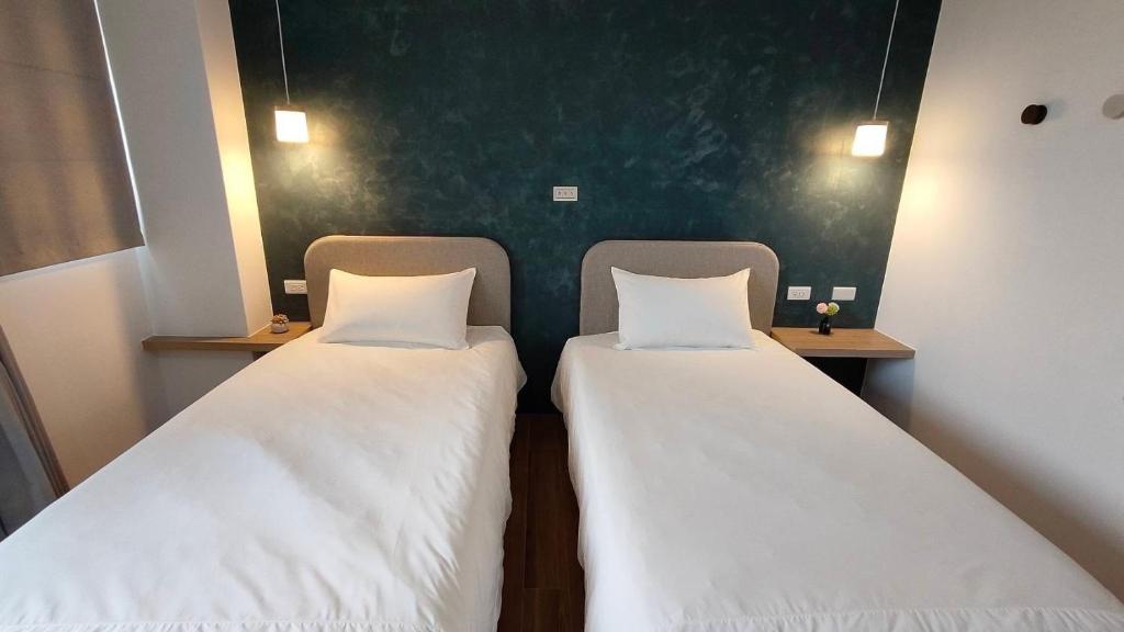 Postel nebo postele na pokoji v ubytování Mi Hai B&B