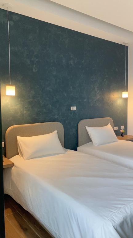 Postel nebo postele na pokoji v ubytování Mi Hai B&B