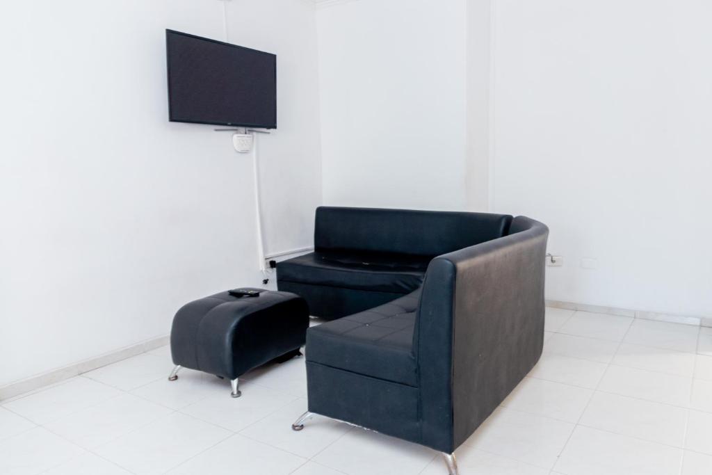 TV a/nebo společenská místnost v ubytování Edificio Sandra