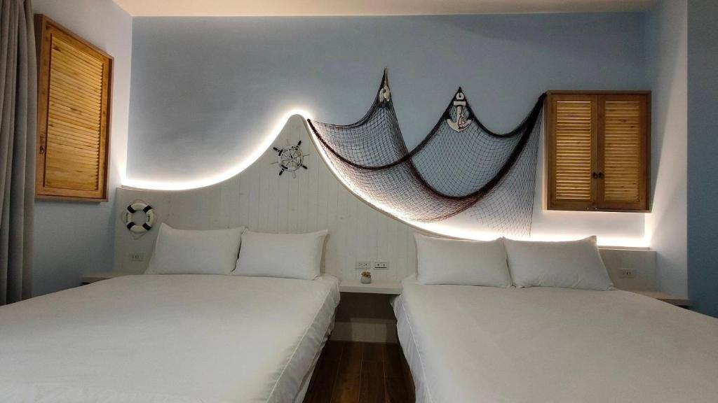 Postel nebo postele na pokoji v ubytování Mi Hai B&B