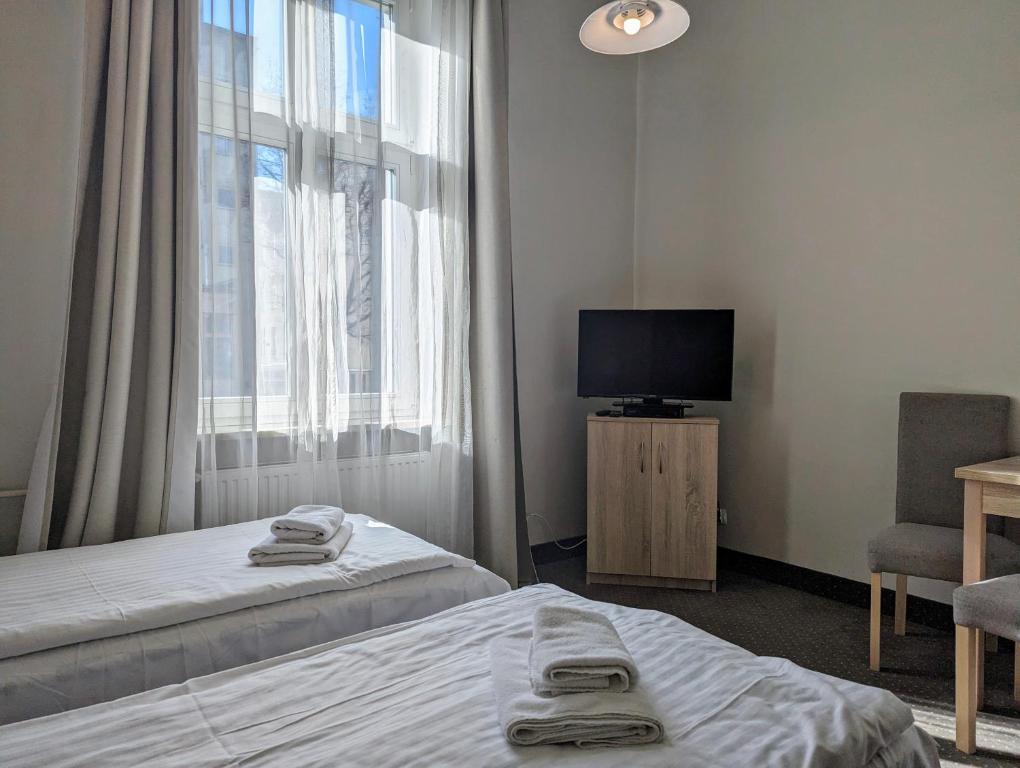 Postel nebo postele na pokoji v ubytování OSW Świnoujście Rybitwa