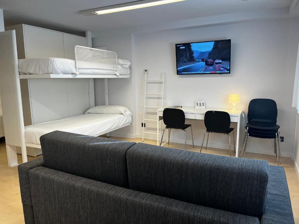 TV a/nebo společenská místnost v ubytování Apartamentos Mundaka