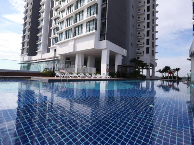 a large swimming pool in front of a building at MidValley SouthKey Mosaic Tower B in Johor Bahru