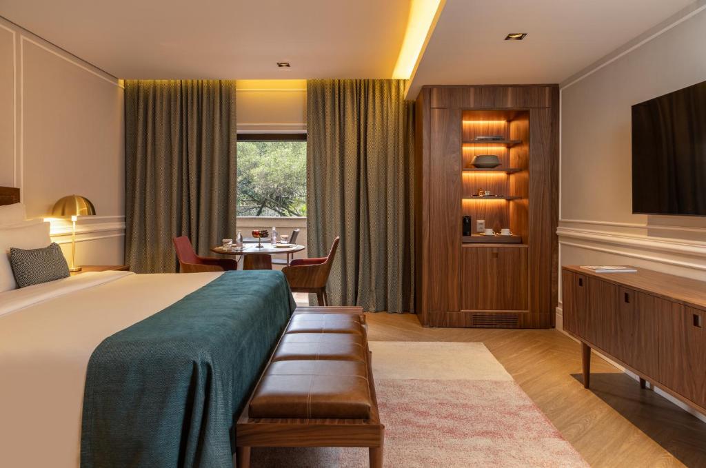 Giường trong phòng chung tại L'Hotel PortoBay São Paulo
