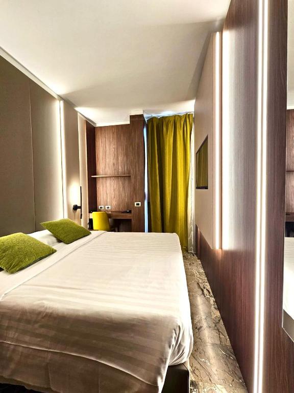 Postel nebo postele na pokoji v ubytování Canova Hotel