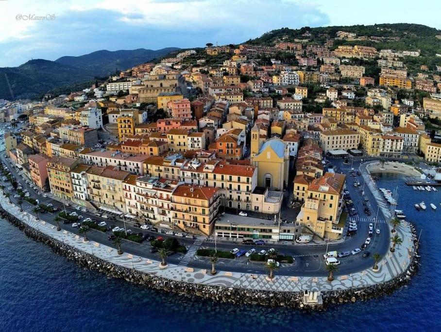 an aerial view of a town on the water at Affitti Brevi Toscana - Ospitalità a P. S. Stefano in Porto Santo Stefano