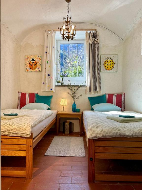 Postel nebo postele na pokoji v ubytování B&B Casa Codega