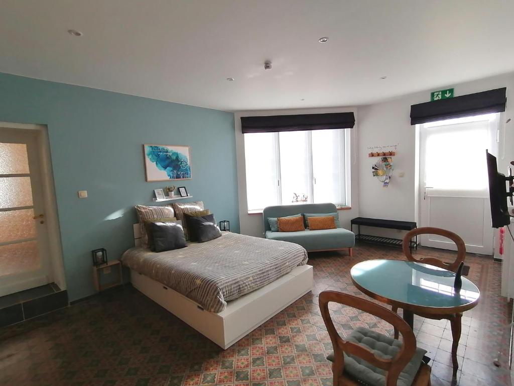 Posezení v ubytování Une Chambre au Verger