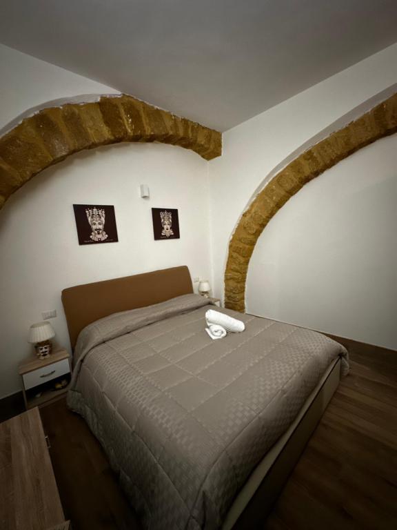 Postel nebo postele na pokoji v ubytování O munti rooms