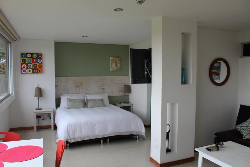 Postel nebo postele na pokoji v ubytování LLanogrande Apartamento Estudio Puerto Bulevar