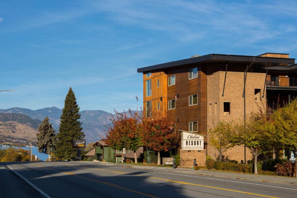 a building on the side of a street at Chelan Resort Suites in Chelan