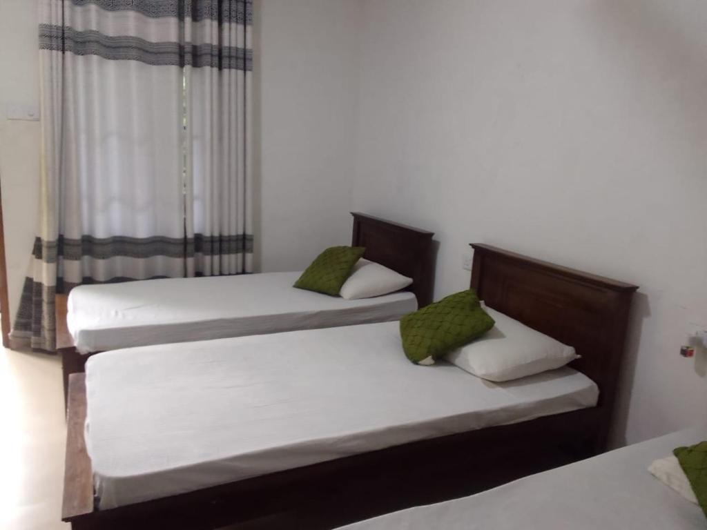 Кровать или кровати в номере Sisila Guest House