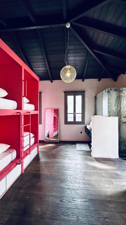 Postel nebo postele na pokoji v ubytování Pink Mango