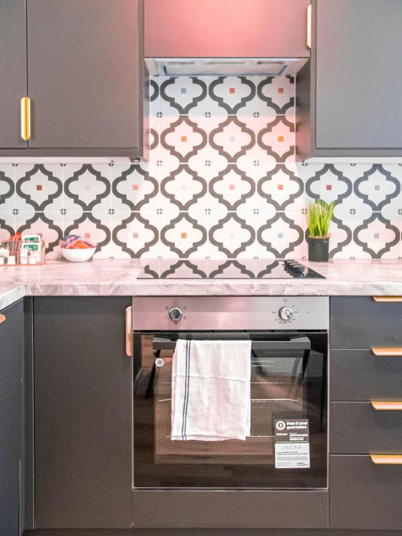 Kuchyň nebo kuchyňský kout v ubytování Hayy ApartHotels Stanley Mills