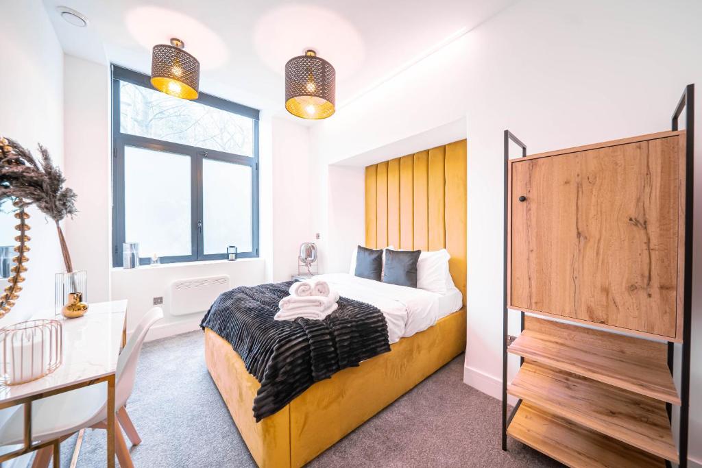 Postel nebo postele na pokoji v ubytování Hayy ApartHotels Stanley Mills