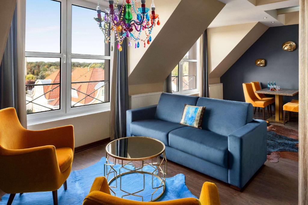 Posezení v ubytování Amedia Hotel & Suites Leipzig, Trademark Collection by Wyndham