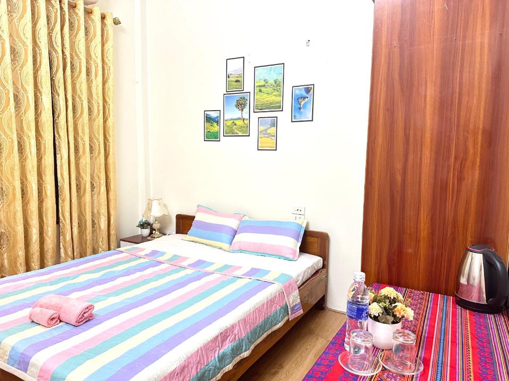 Giường trong phòng chung tại Huong Thao Hostel & Tours