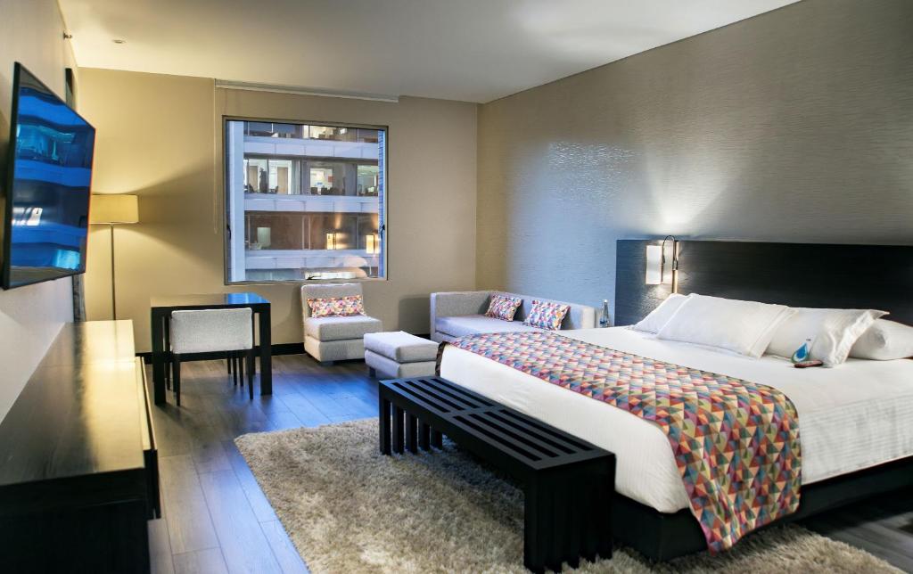Postel nebo postele na pokoji v ubytování Cité Hotel
